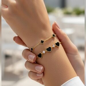 Eye Candy Gold Toned Heart & Clover Set of 2 Adjustable Bracelets Box included